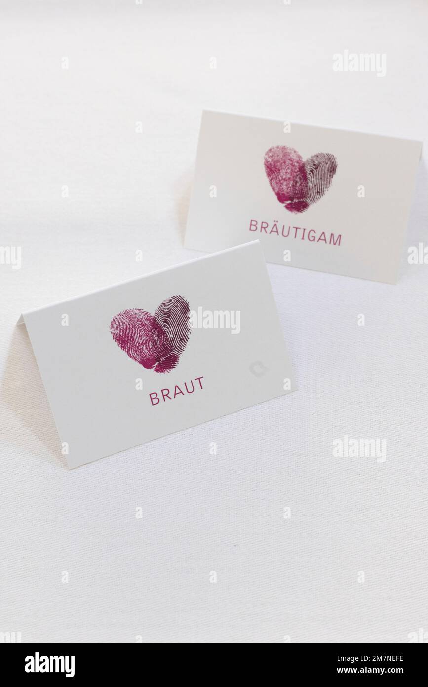 Place cards with fingerprint of bride and groom Stock Photo - Alamy