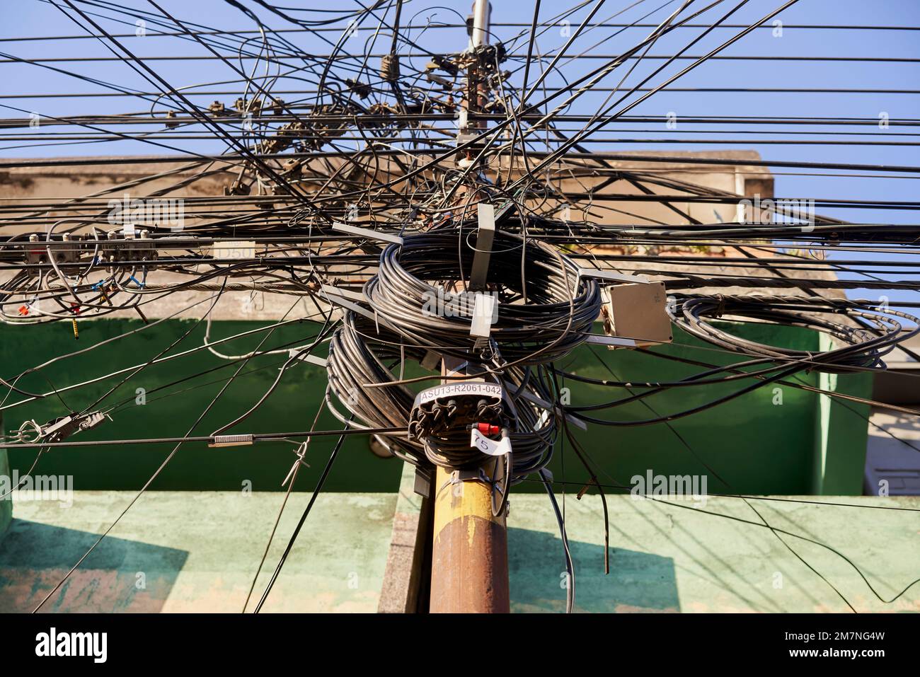maze of overhead electricity and phone cables Stock Photo Alamy