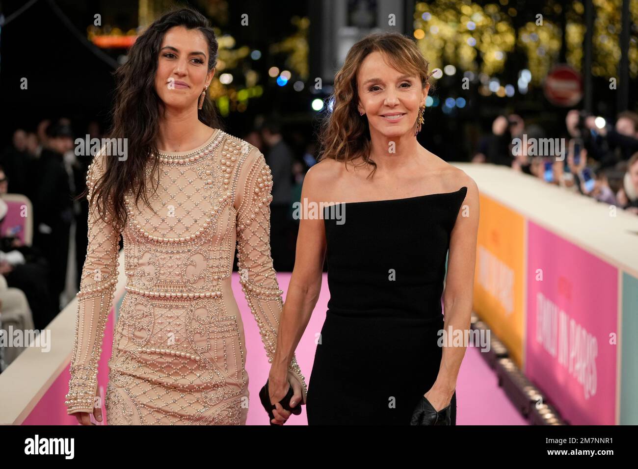 Philippine Leroy-Beaulieu, right, arrives for the World Premiere of the