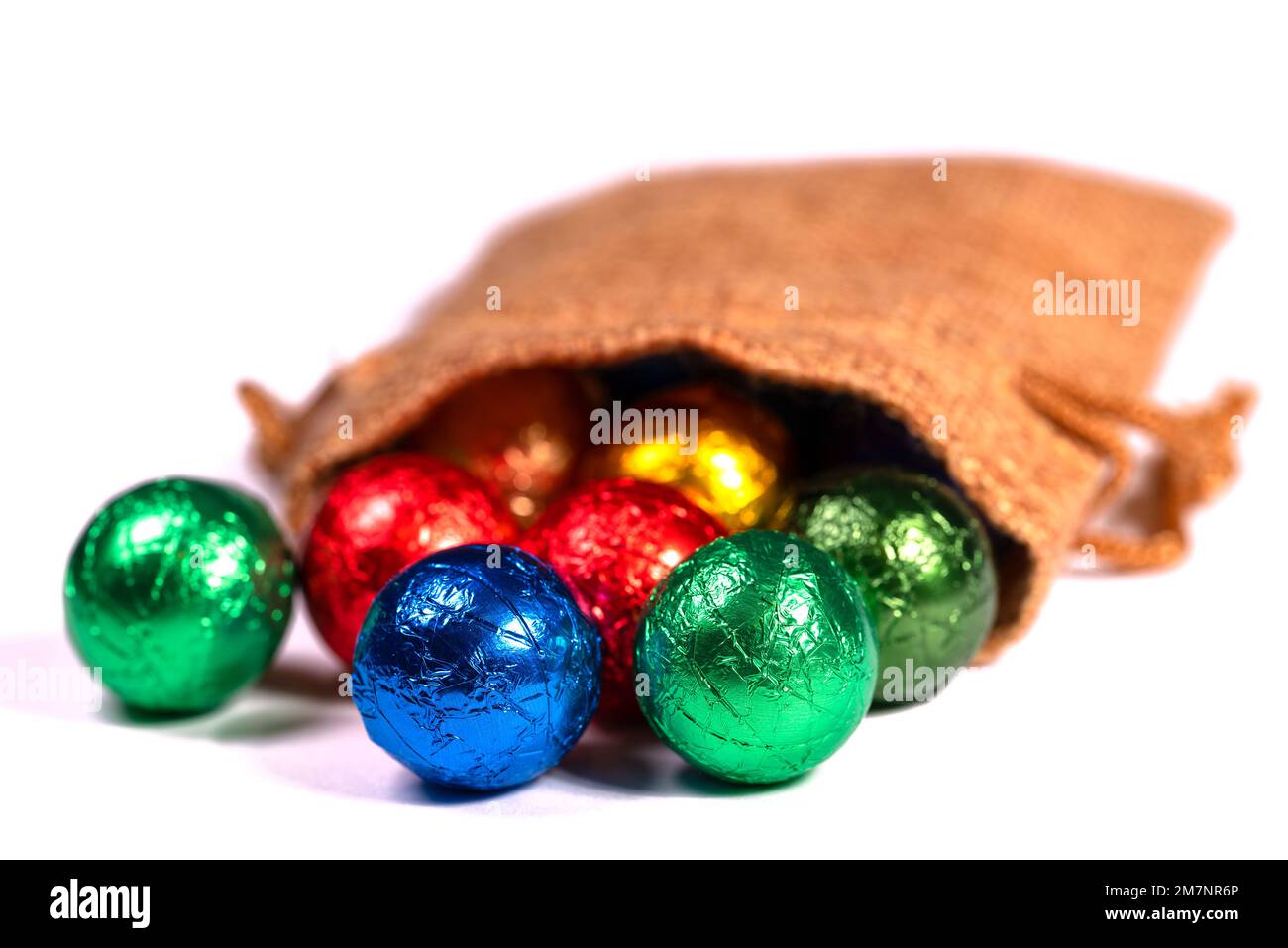 Colorful chocolate balls in a jute sack Stock Photo Alamy
