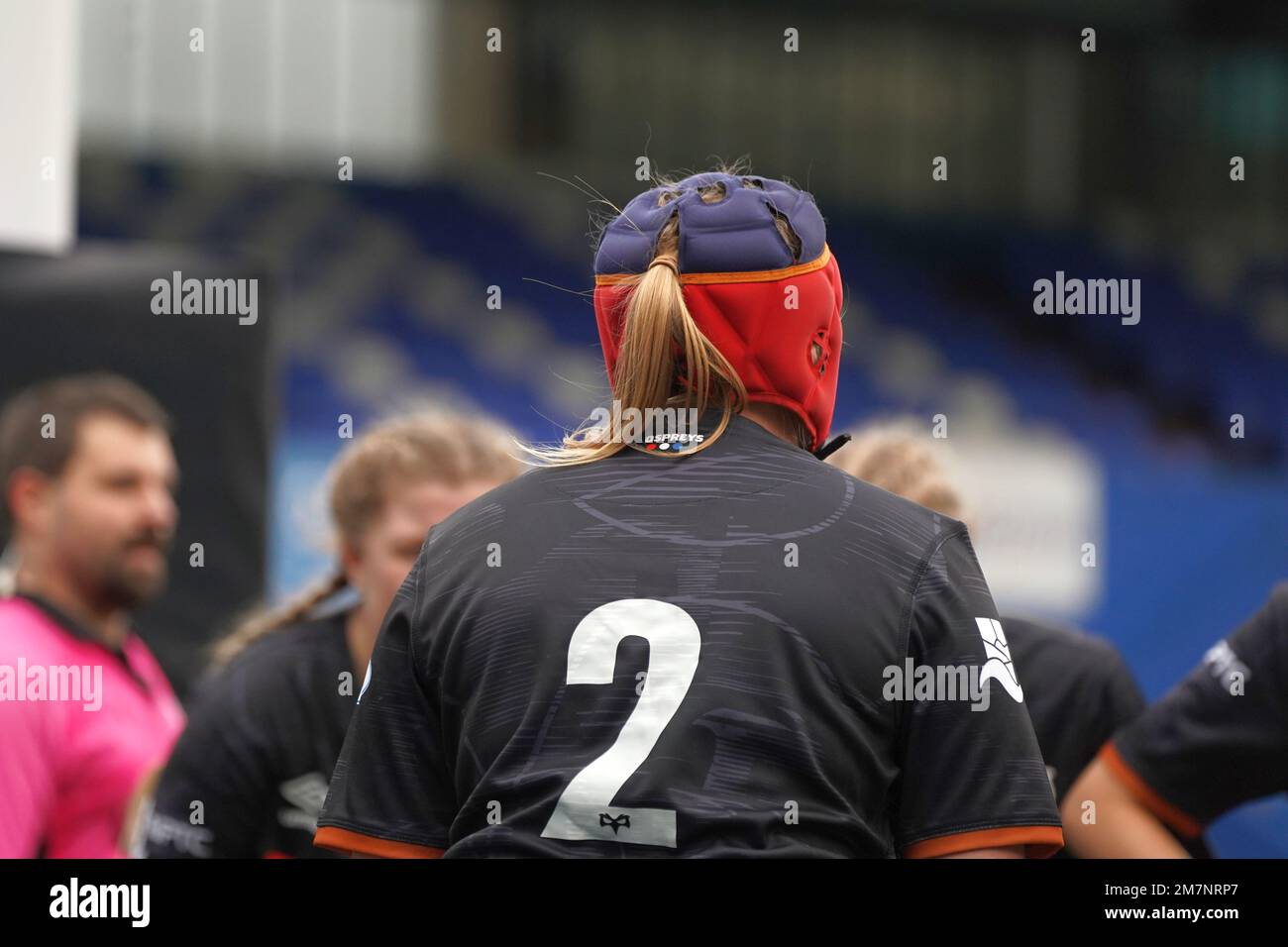 Female rugby player wearing rugby scrum skull cap Stock Photo Alamy