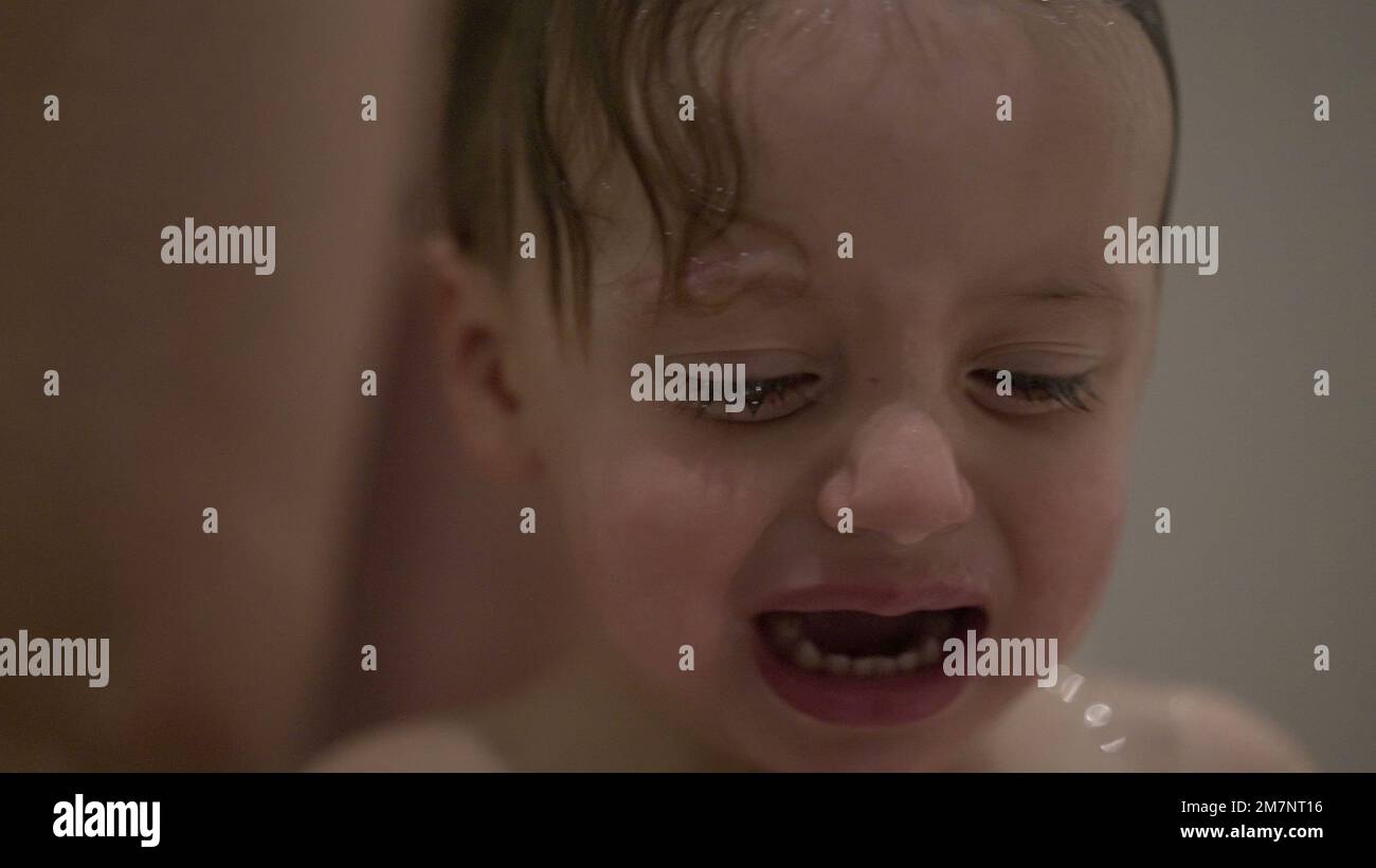 Baby toddler tantrum inside shower bath Stock Photo Alamy