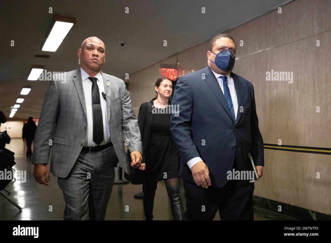Manhattan district attorney Alvin Bragg, right, arrives to a courtroom