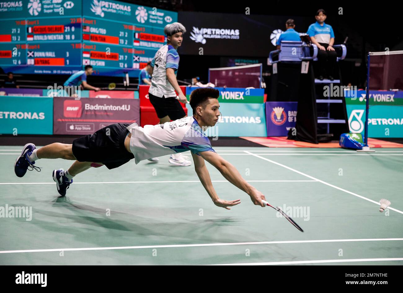 Kuala Lumpur, Malaysia. 10th Jan, 2023. Ong Yew Sin and Teo Ee Yi of Malaysia competes against Ren Xiang Yu and Tan Qiang of China during the Men's Doubles first round match of the Petronas Malaysia Open 2023 at Axiata Arena. Ong Yew Sin and Teo Ee Yi of Malaysia won with scores; 21/20/21 : 13/22/15. Credit: SOPA Images Limited/Alamy Live News Stock Photo