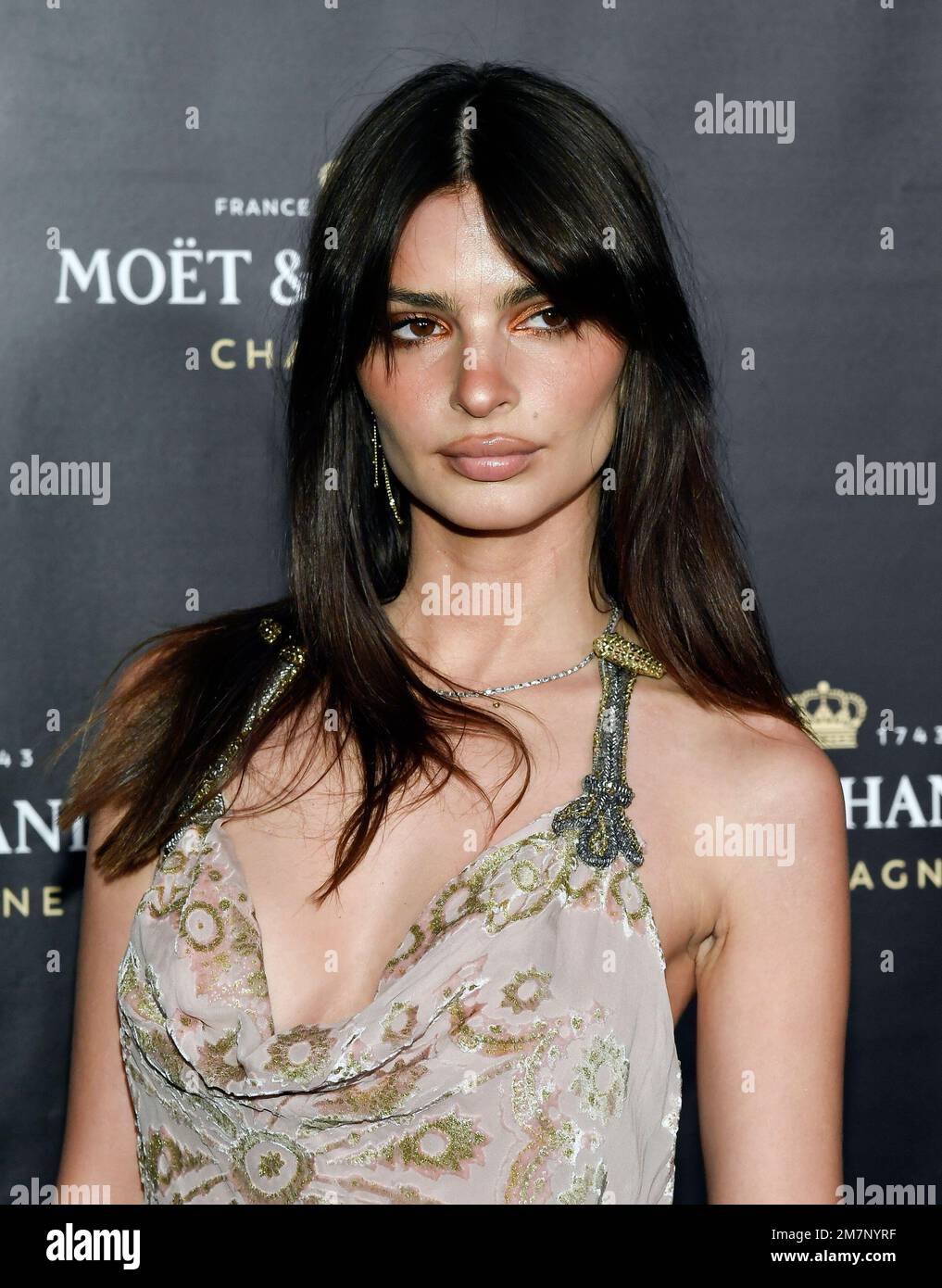 Emily Ratajkowski attends the Moet & Chandon holiday season celebration