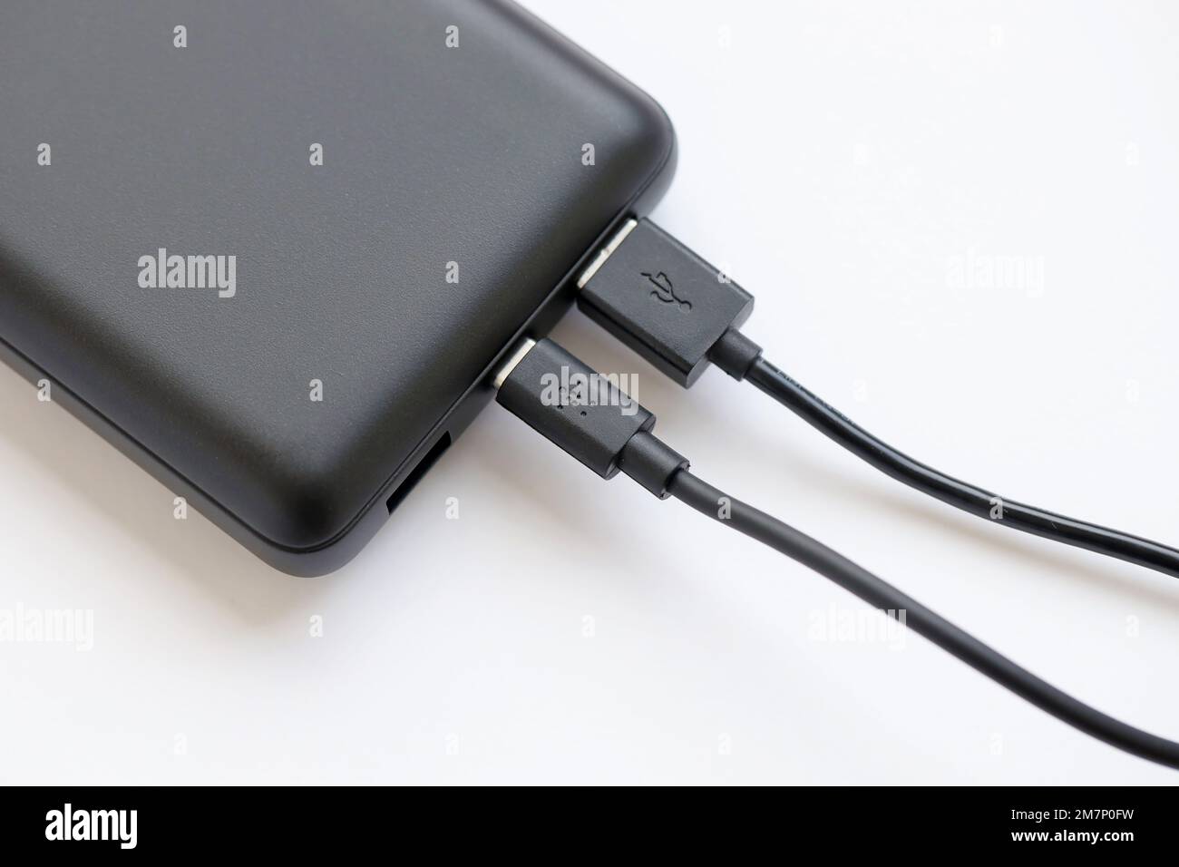 KYIV, UKRAINE - MAY 4, 2022 Portable Powerbank battery with logo of Belkin International, american manufacturer of consumer electronics that specializes in connectivity devices Stock Photo