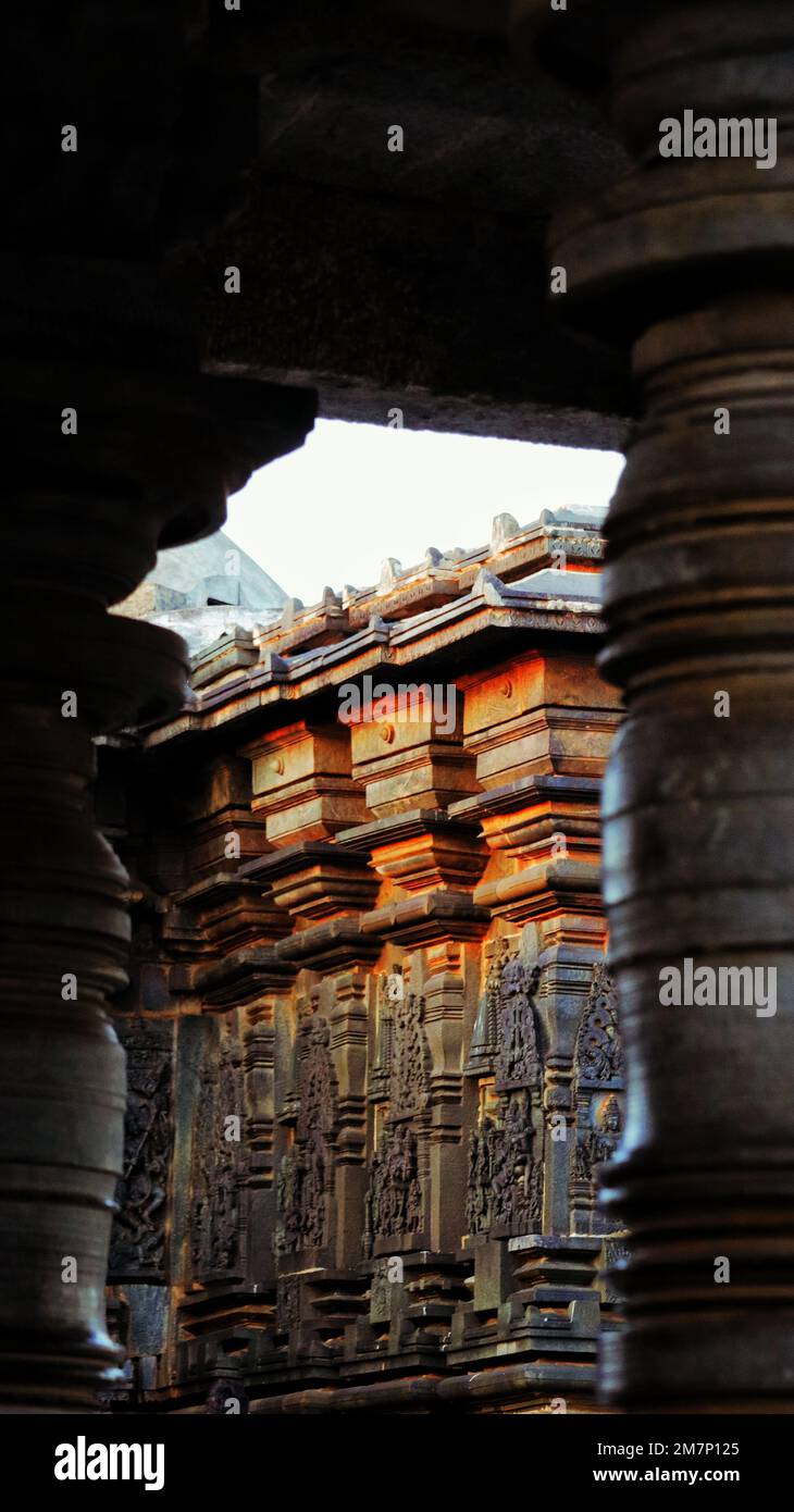 A vertical shot of the walls and pillars of the Chennakesava Temple in Somanathapura, India Stock Photo