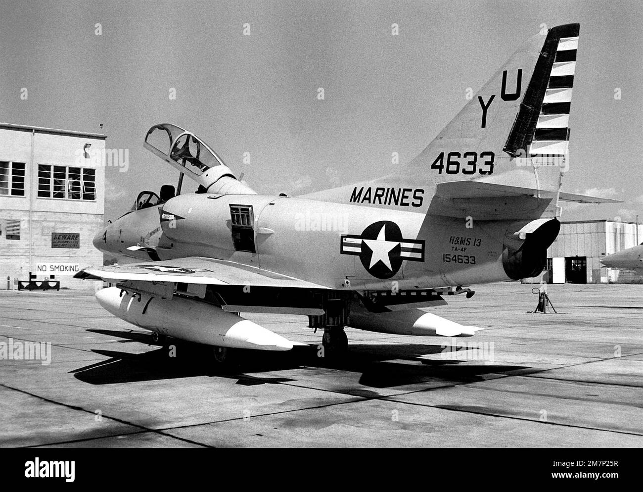 Left rear view of the last TA-4F Skyhawk aircraft to be received at this Marine Corps Air Station. The A-4 is a 'work horse' used by the infantry in many close air support missions. Base: Marine Corps Air Station El Toro State: California (CA) Country: United States Of America (USA) Stock Photo