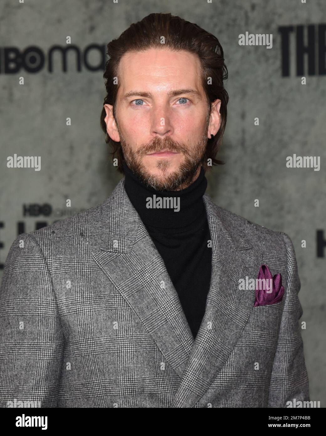 Troy Baker arrives at HBO's THE LAST OF US Premiere held at the Regency  Village Theater in Westwood, CA on Monday, ?January 9, 2023. (Photo By  Sthanlee B. Mirador/Sipa USA Stock Photo 