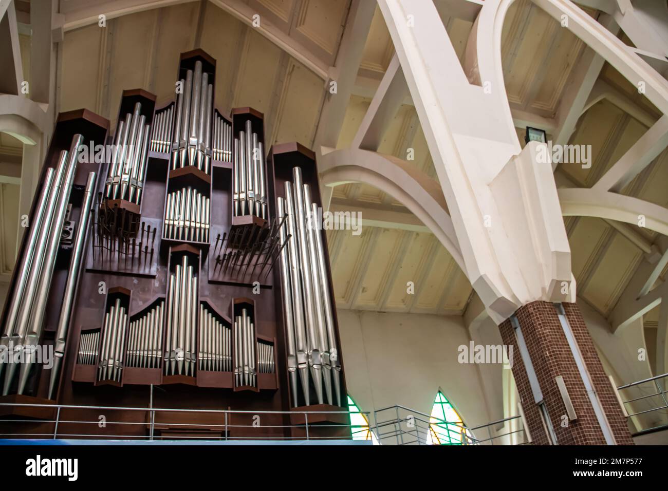 Church pipe organ instrument made of metal and wood, in Catholic church