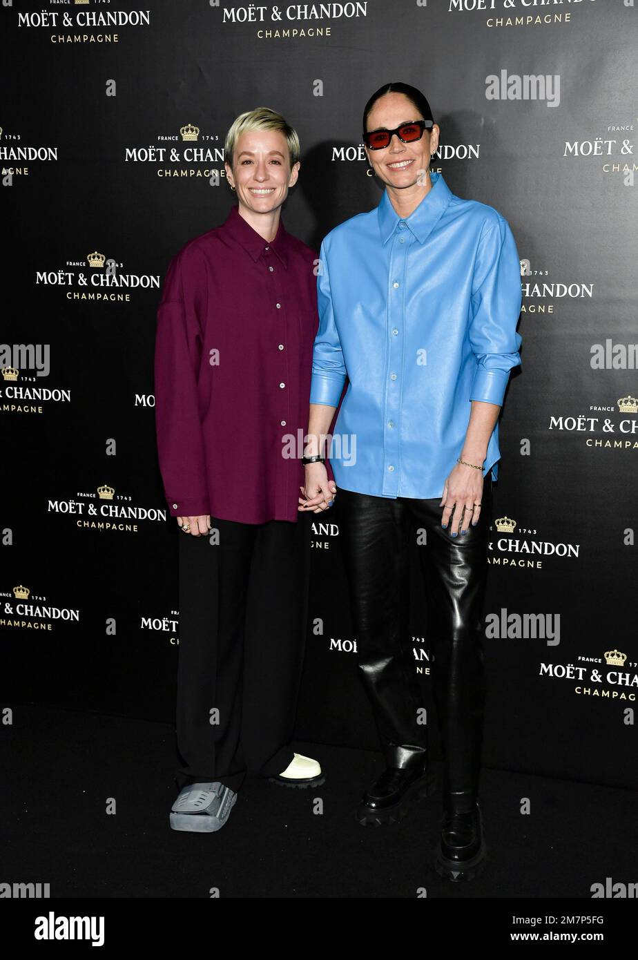 Megan Rapinoe, left, and Sue Bird attend the Moet & Chandon holiday