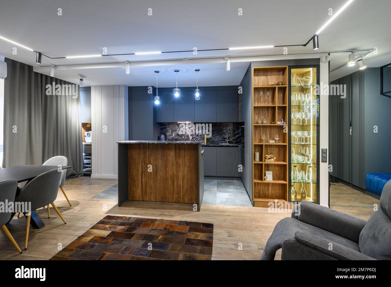 Luxury living room and kitchen in studio apartment Stock Photo - Alamy
