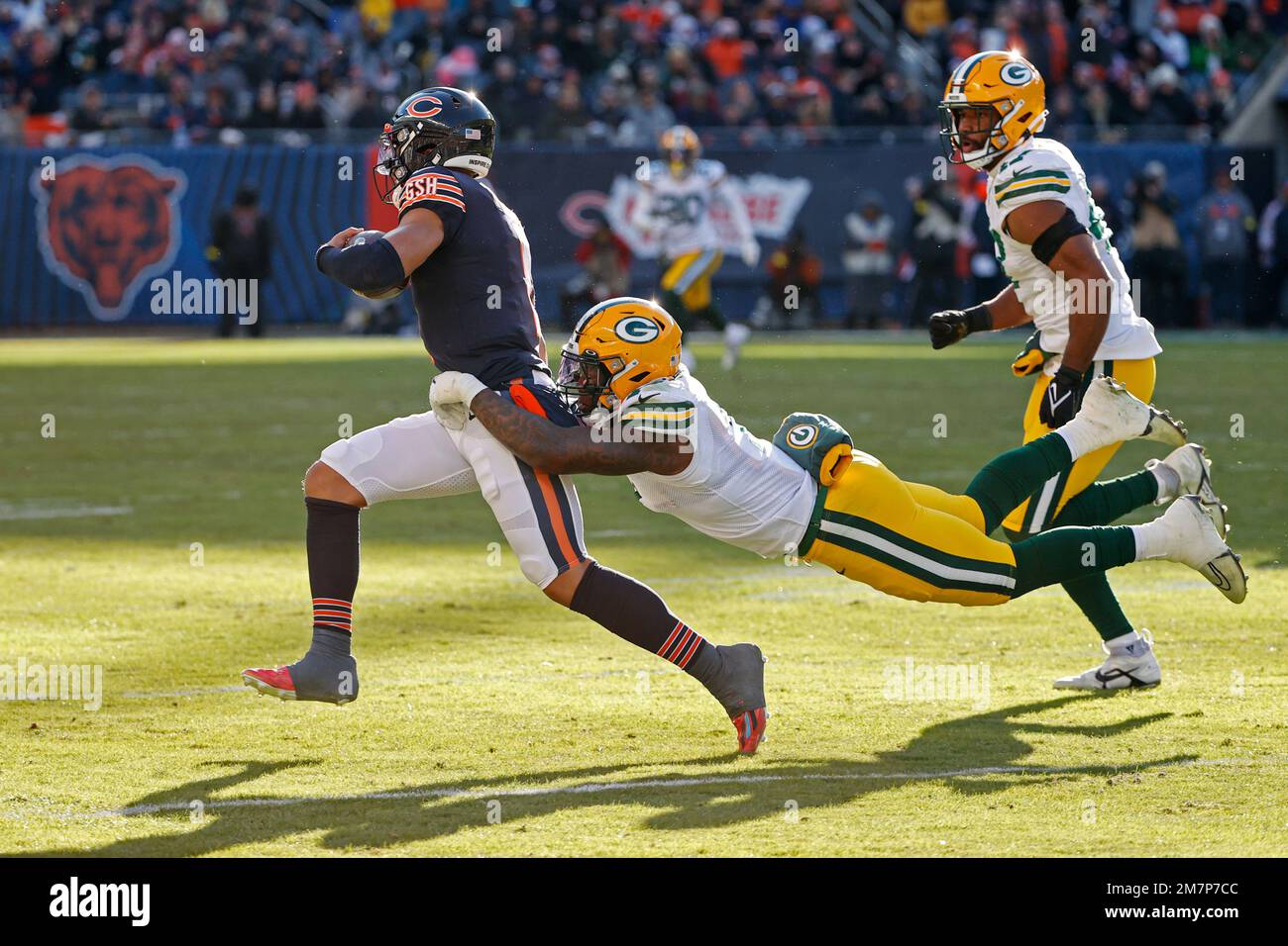 Chicago Bears Quarterback Justin Fields (1) Is Tackled By Green Bay ...