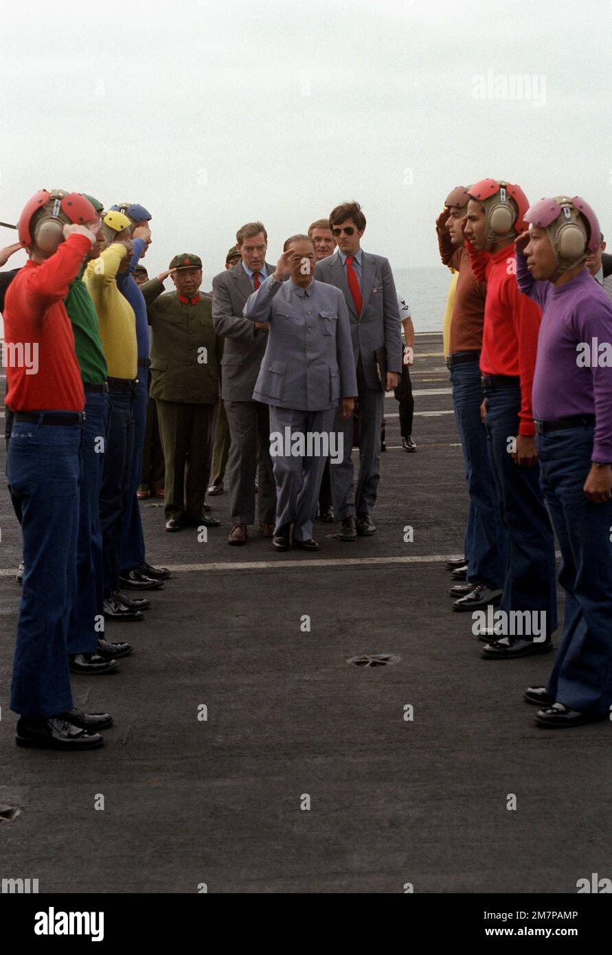 Vice Premier Geng Biao of China is given a tour of the aircraft carrier ...