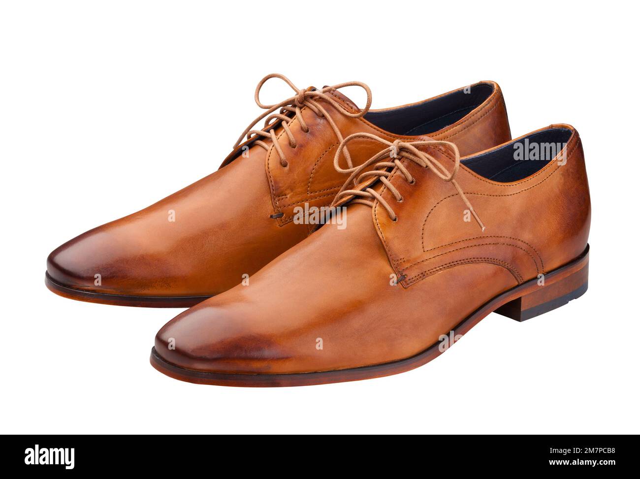 A pair of brown leather gent´s shoes on a white background Stock Photo