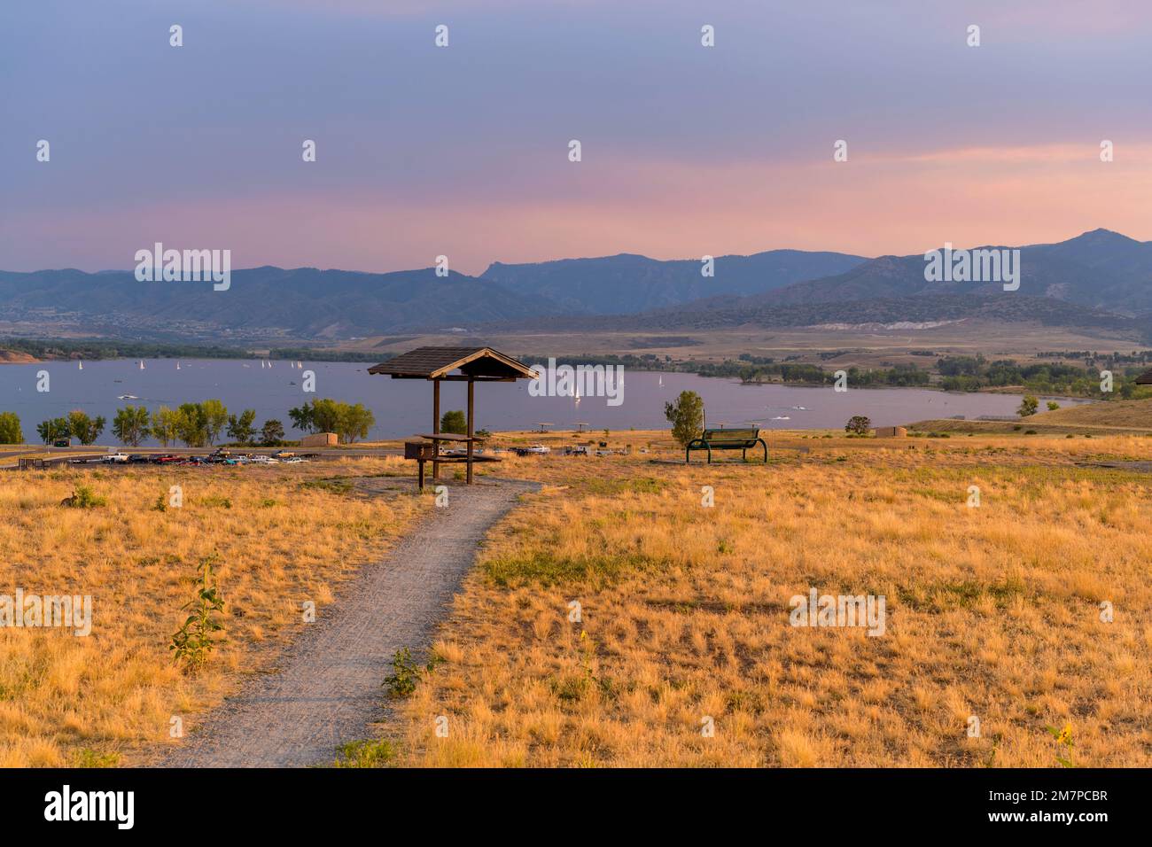 Sunset Summer Park - A Summer sunset view of a quiet picnic area at top of Chatfield Dam, Chatfield State Park, Denver-Littleton, Colorado, USA. Stock Photo