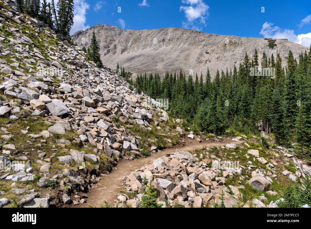 Rocky Trail - A rocky section of Blue Lake Trail in Indian Peaks Wilderness on a sunny Summer afternoon, Colorado, USA. Stock Photo