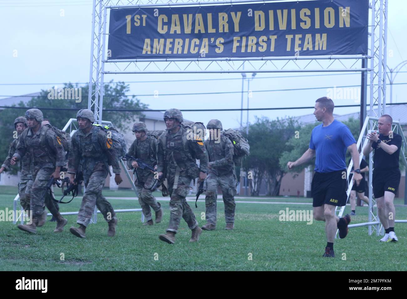 1st Cavalry Division Troopers complete the final event, the 12 mile ...
