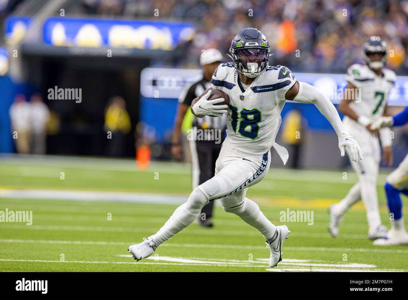 Seattle Seahawks wide receiver Laquon Treadwell (18) catches a pass and  runs against the Los Angeles Rams in an NFL football game, Sunday, Dec. 4,  2022, in Inglewood, Calif. Seahawks won 27-23. (
