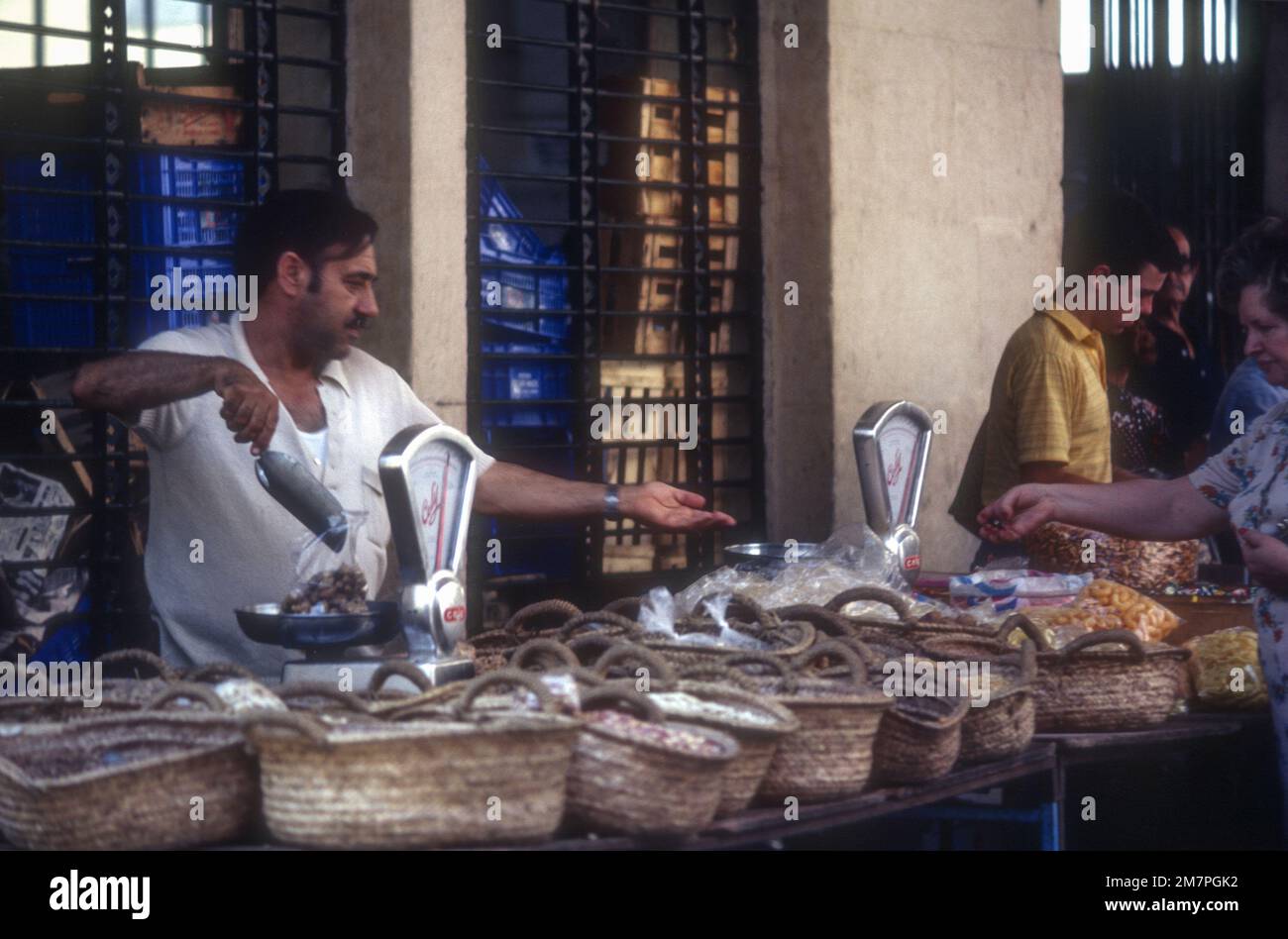 1981 archive image of a stallholder on Felanitx market, Majorca, Spain. Stock Photo