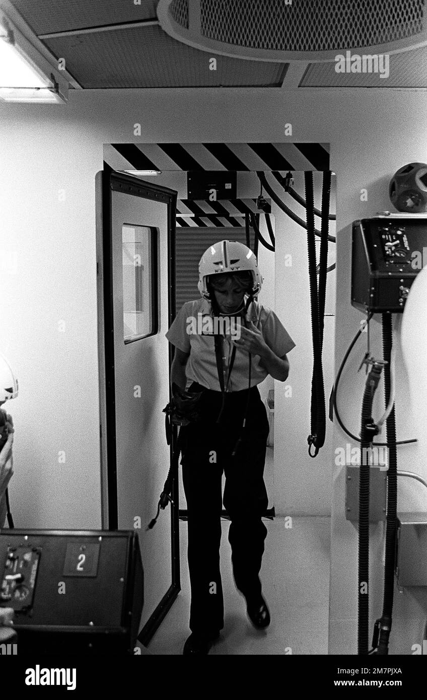 Midshipman Cindy Mason walks into the inner area of the hyperbaric ...