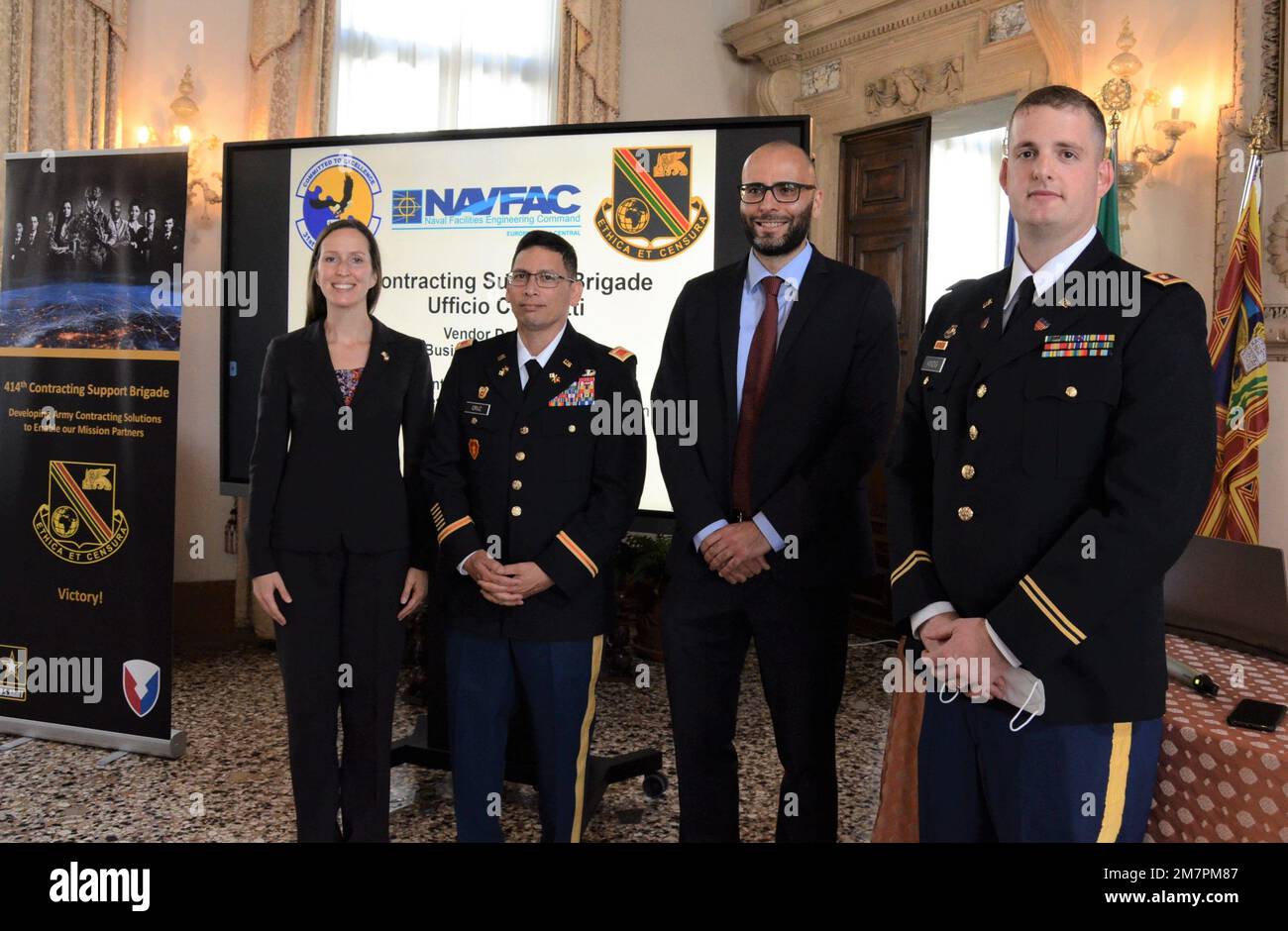 VICENZA, Italy - (From left to right)  Zoja Bazarnic, Political and Economic Chief at the U.S. Consulate in Milan, Col. Frankie Cruz, 414th Contracting Support Brigade commander, Silvio Giovine, Vicenza’s Councilor for Commerce and Industry and Maj. Matthew Kindig, 414th CSB pose for a picture during the Vendors Day May 11, 2022.    The event - held in the “Stucchi Room” of Palazzo Trissino, a 16th-century palace in downtown Vicenza that houses the town hall - was coordinated by Vicenza officials, with support from the 414th Contracting Support Brigade and U.S. Army Garrison Italy. Representat Stock Photo