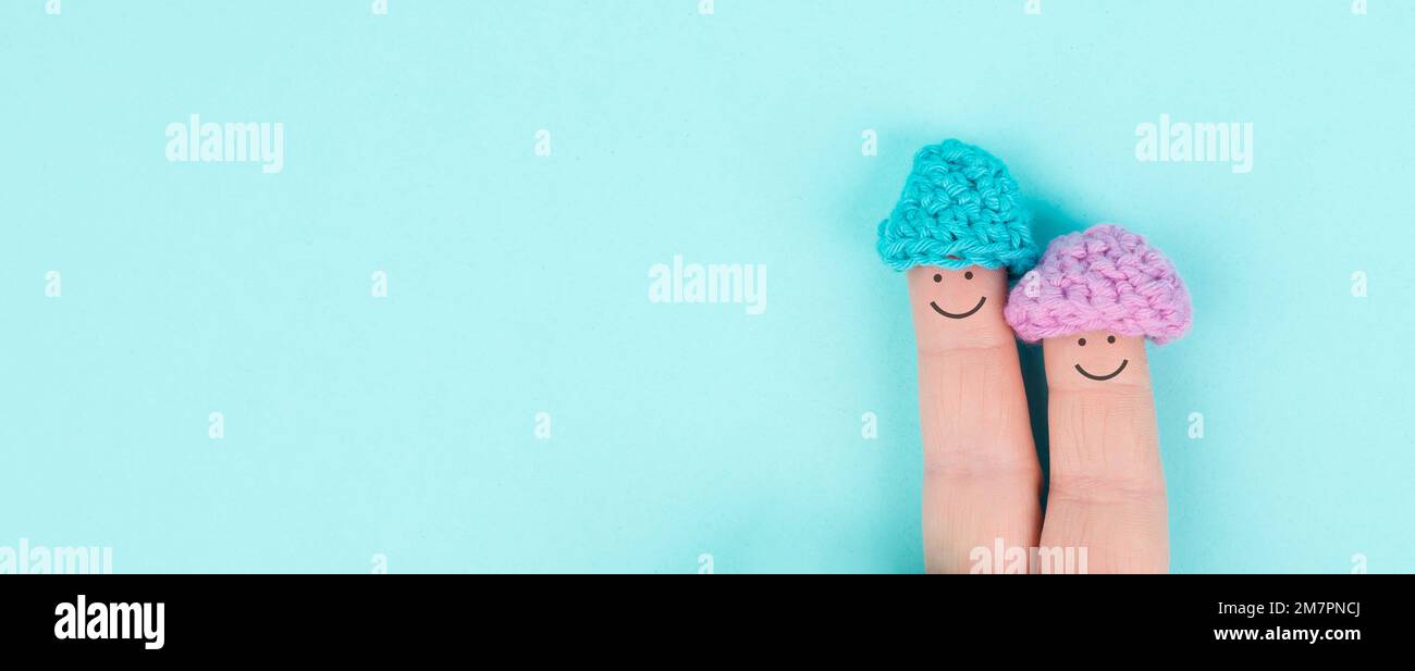 Happy, similing face on finger, couple cuddle together, support ...