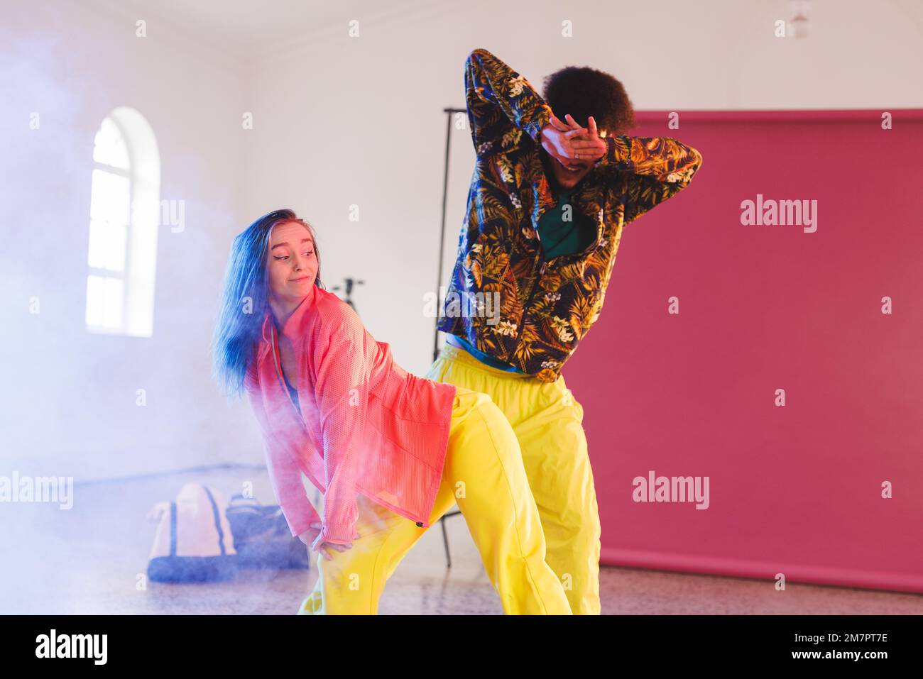 Image of happy diverse female and male hip hop dancers in studio Stock Photo