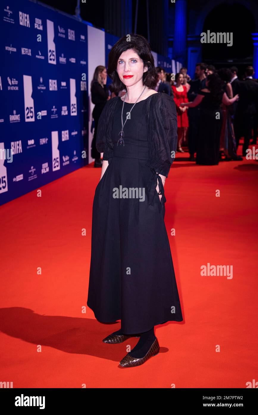 Becky Hutner poses for photographers upon arrival for 'The British