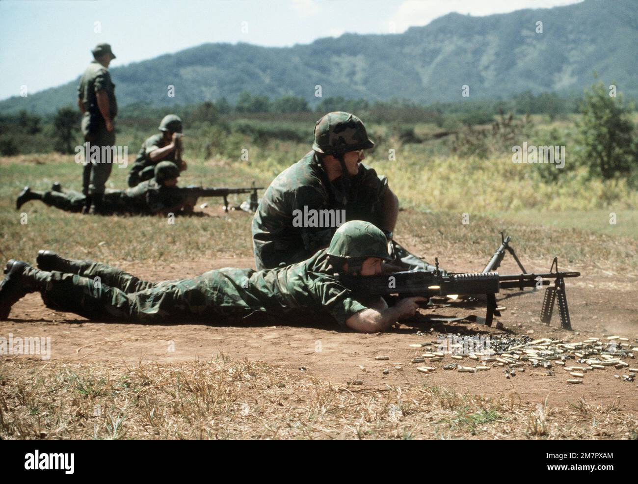 Combat control team (CCT) members fire the M60 machine gun. Base