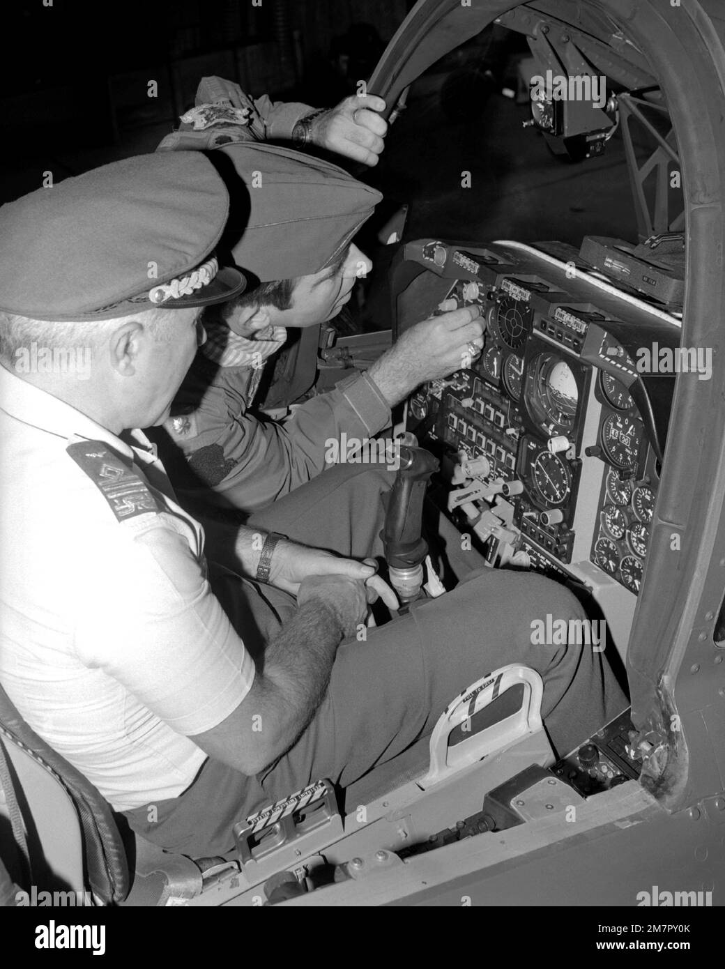 A U.S. Air Force pilot briefs Italian air force GEN Basilio Cottone