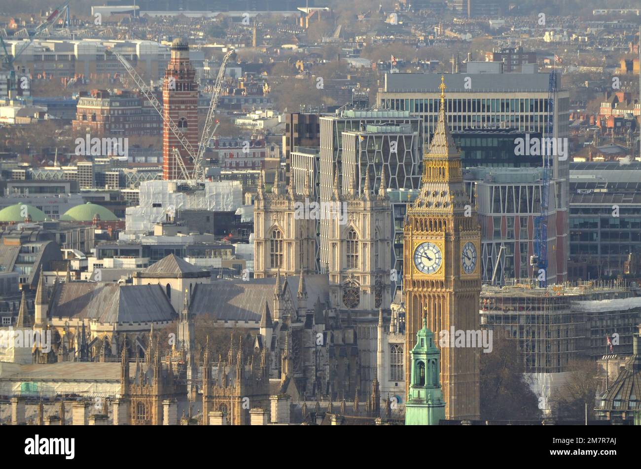 The Elizabeth Tower at Westminster in London featuring the famous clock Big Ben, with Westminster Abbey behind. Stock Photo