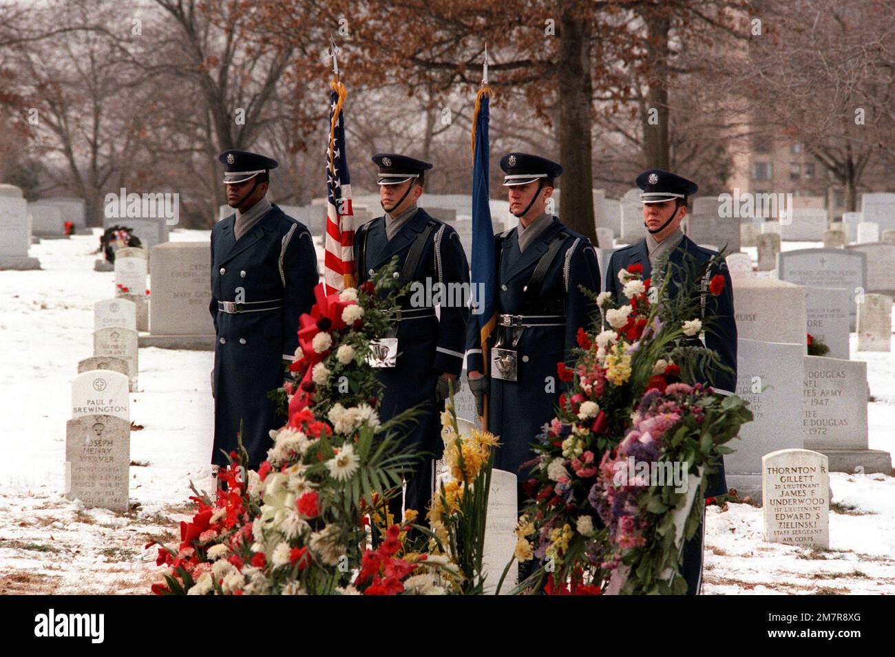 The Air Force Honor Guard takes part in the graveside service at Arlington National Cemetery for Michael Hammer, killed in San Salvador while assigned there as AFL-CIO labor specialist for the State Department. Base: Arlington State: Virginia (VA) Country: United States Of America (USA) Stock Photo