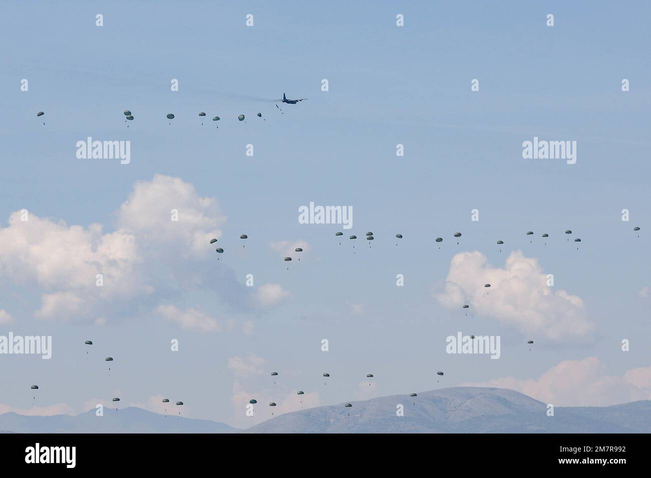 Italian Paratroopers conduct Airborne Operations during DV-Day as part of Exercise Swift Response on May 12, 2022, at Krivolak Training Area, North Macedonia. The purpose of this exercise is to present combat credible Army forces in Europe and Africa, and enhance readiness by building airborne interoperability with Allies and Partners and the integration of joint service partnership. Stock Photo