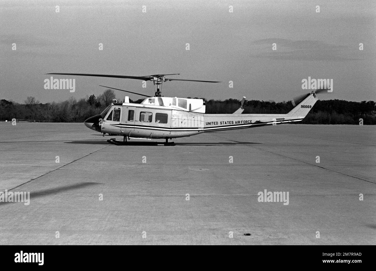 A left side view of an Air Force UH1 Iroquois helicopter from the 1ST