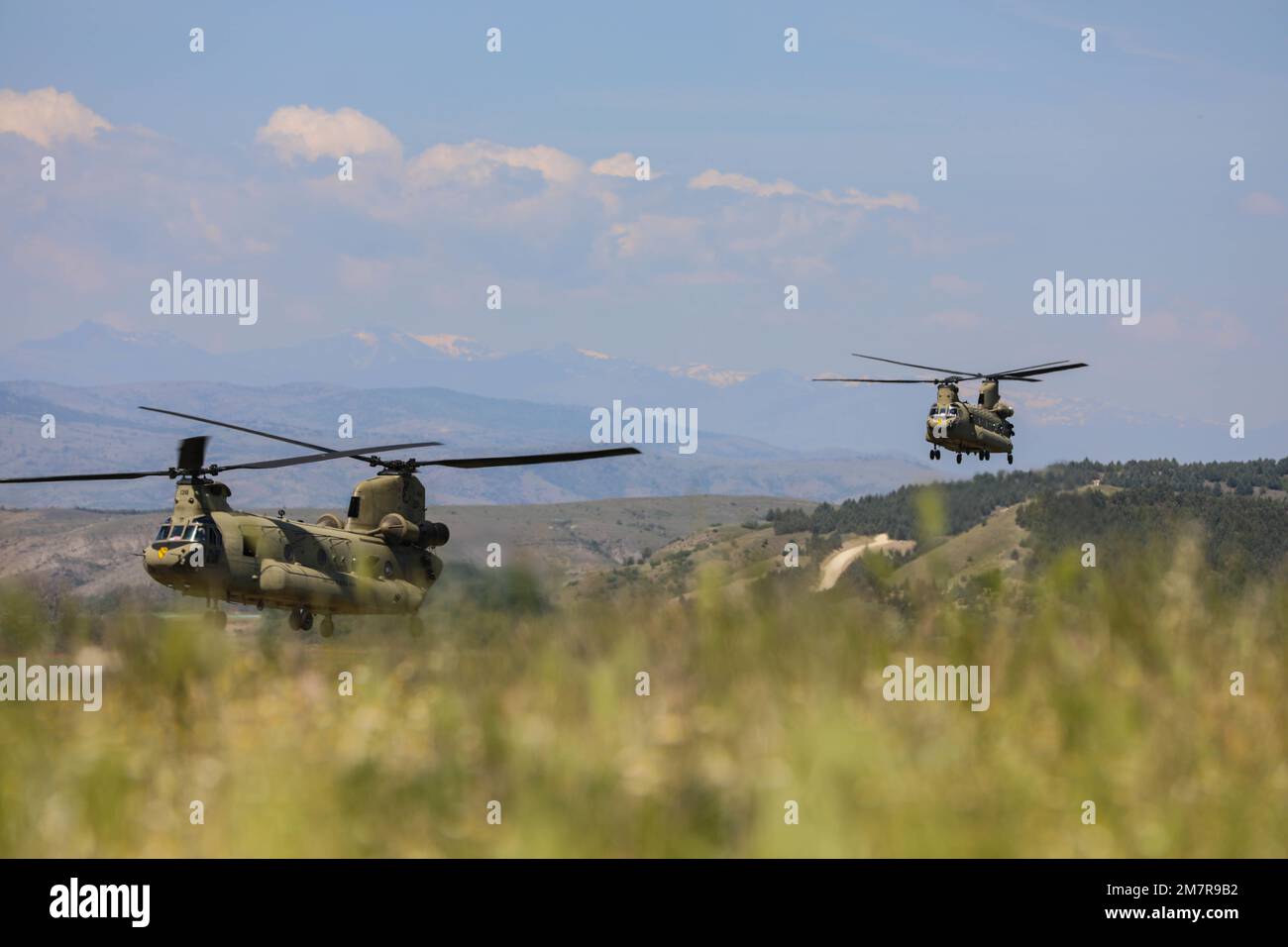 U.S. and NATO allies utilized CH-47 Chinooks from the 1st Air Cavalry Brigade to conduct Air Assault operations for DV-Day during Exercise Swift Response on May 12, 2022, at Krivolak Training Area, North Macedonia. The purpose of this exercise is to present combat credible Army forces in Europe and Africa, and enhance readiness by building airborne interoperability with Allies and Partners and the integration of joint service partnership. Stock Photo