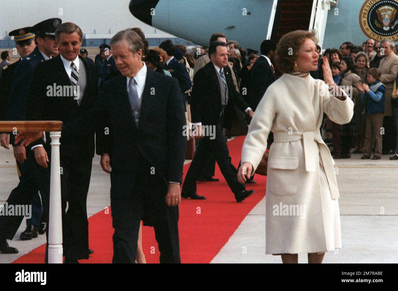 Former First Lady Rosalynn Carter blows well-wishers a kiss, as she and ...
