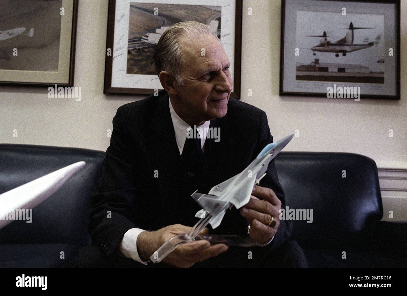 A candid photograph of Secretary of the Air Force Verne Orr seated on a