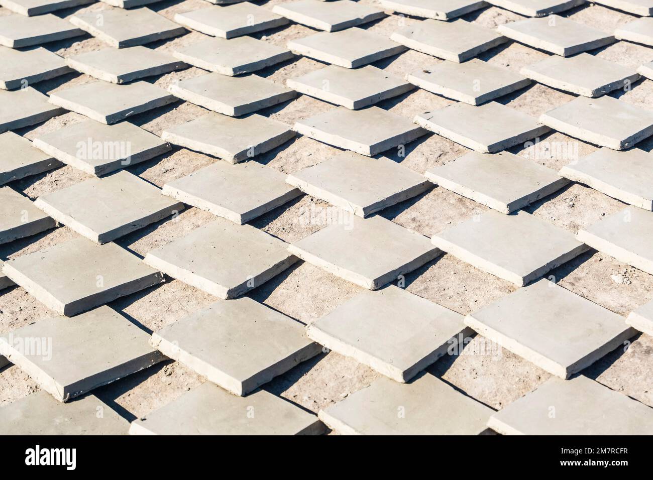 Plenty of clay tiles drying on Africa sun in pottery factory in Fez, Morocco, North Africa Stock Photo