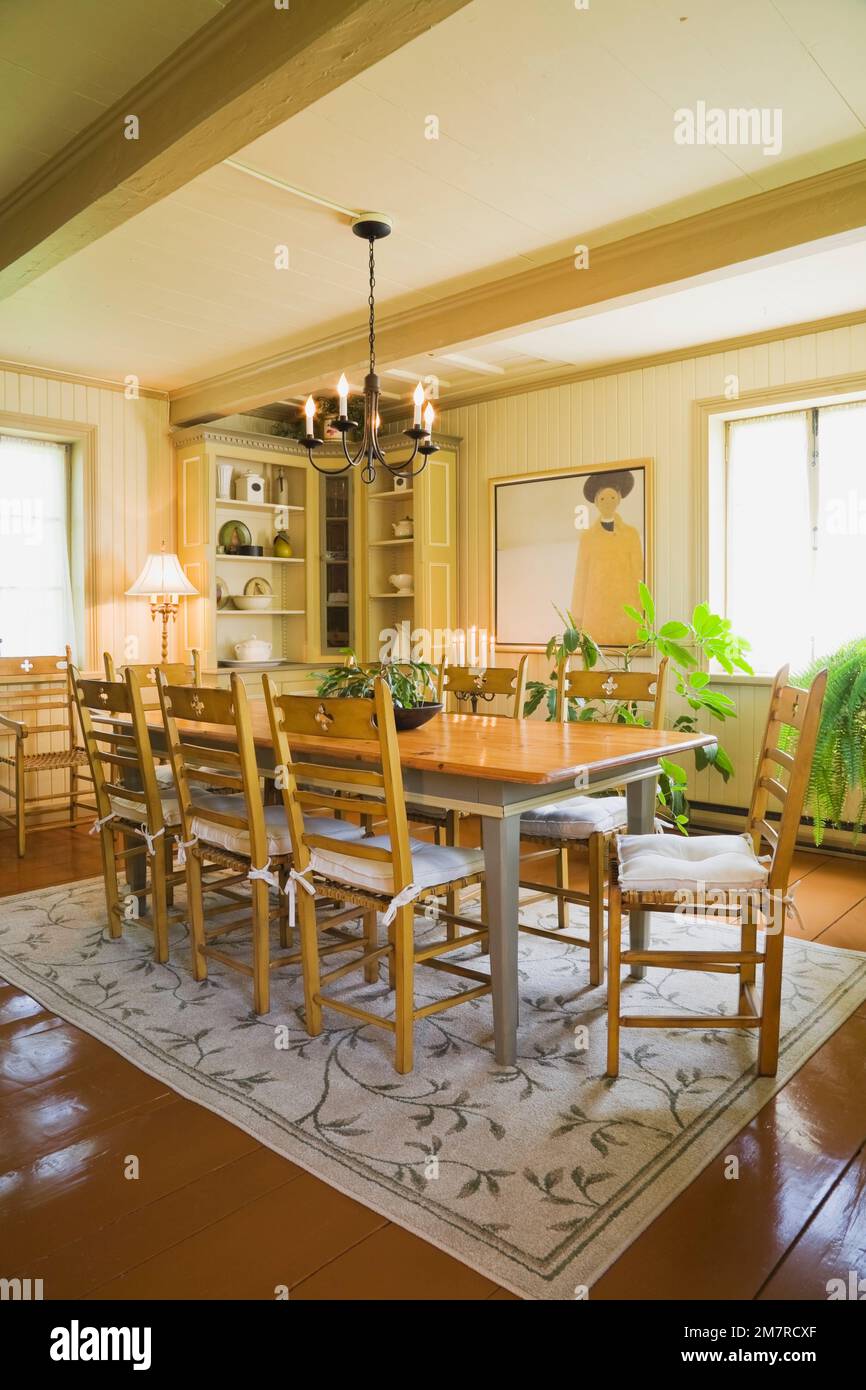 Antique wooden table and chairs in the dining room inside an old