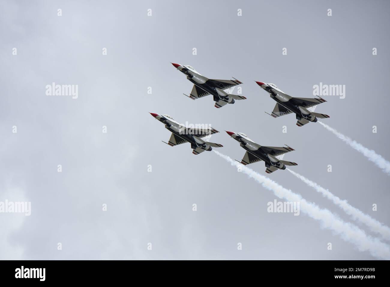 Four U.S. Air Force Thunderbirds fly over during a practice for Skyfest 2022 at Fairchild Air