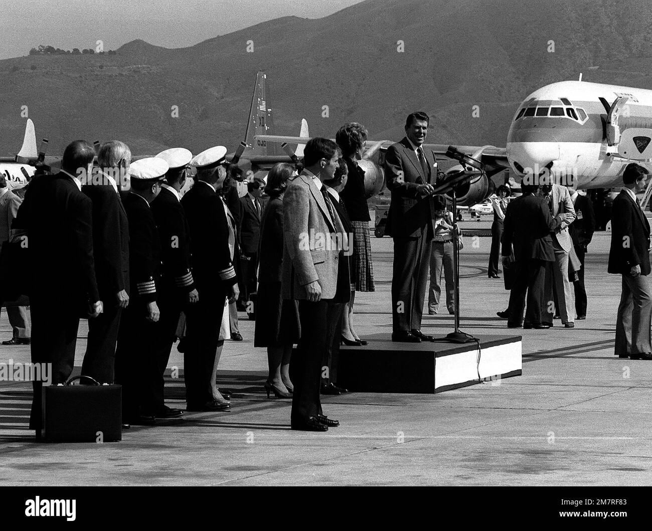 President Ronald Reagan speaks before a group during a visit to the Pacific Missile Test Center. Base: Naval Air Station, Point Mugu State: California (CA) Country: United States Of America (USA) Stock Photo