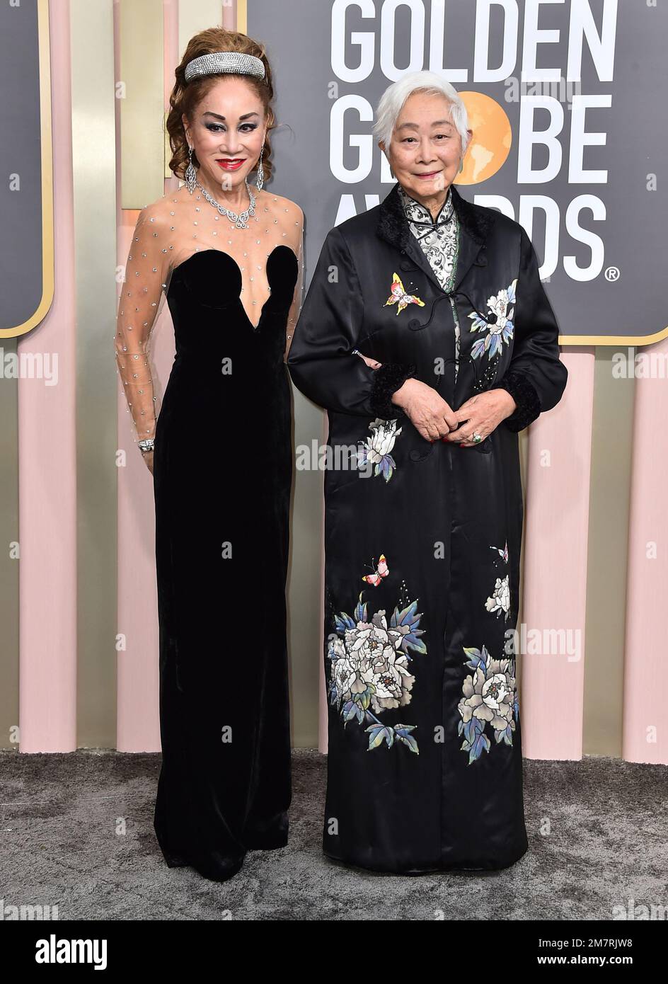 Lisa Lu, right, and Lucia Hwong arrive at the 80th annual Golden Globe