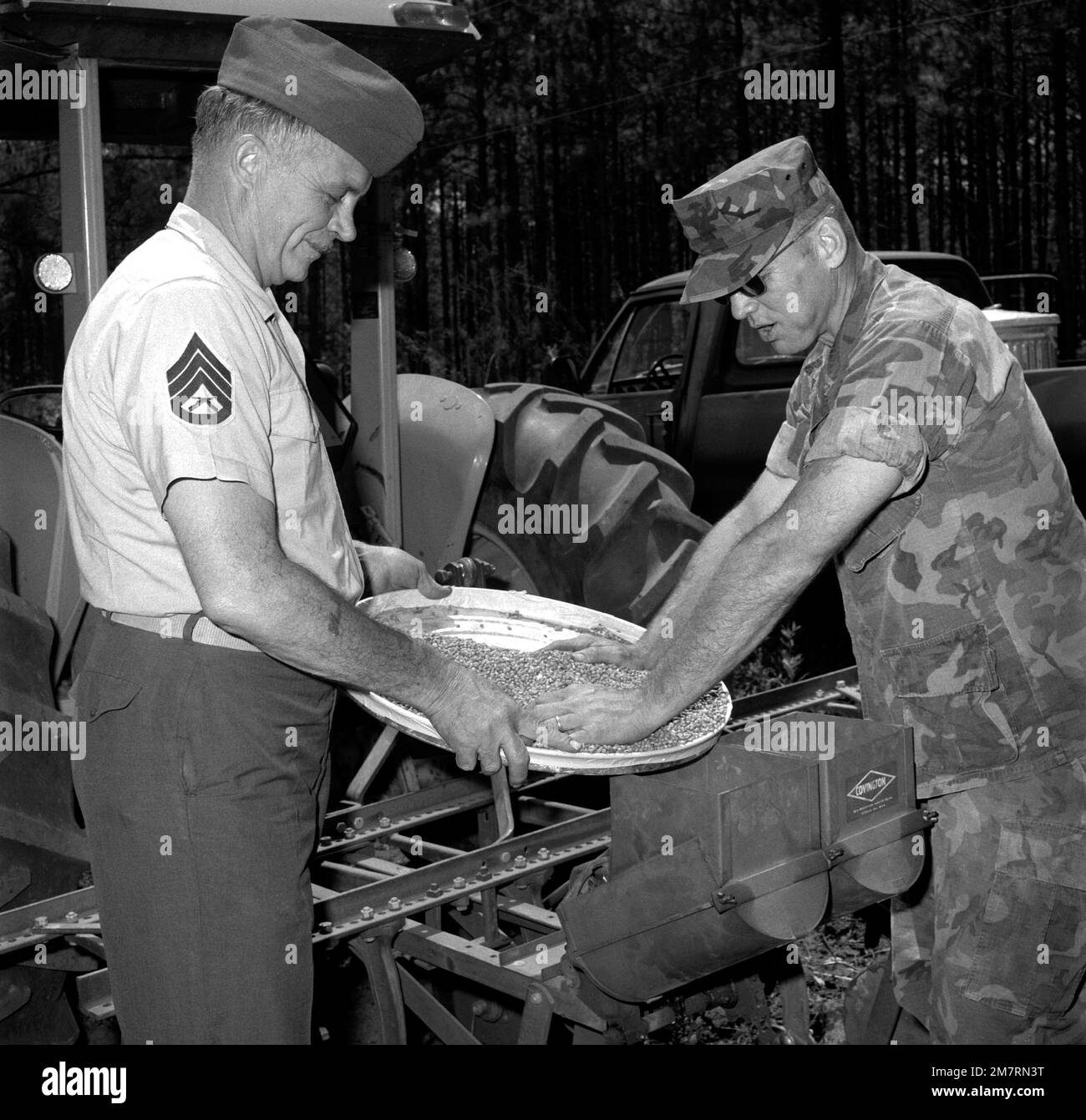 gysgt-c-w-simpson-and-ssgt-e-m-curtis-prepare-a-food-plot-for-the-wild-game-at-the-indian-lake