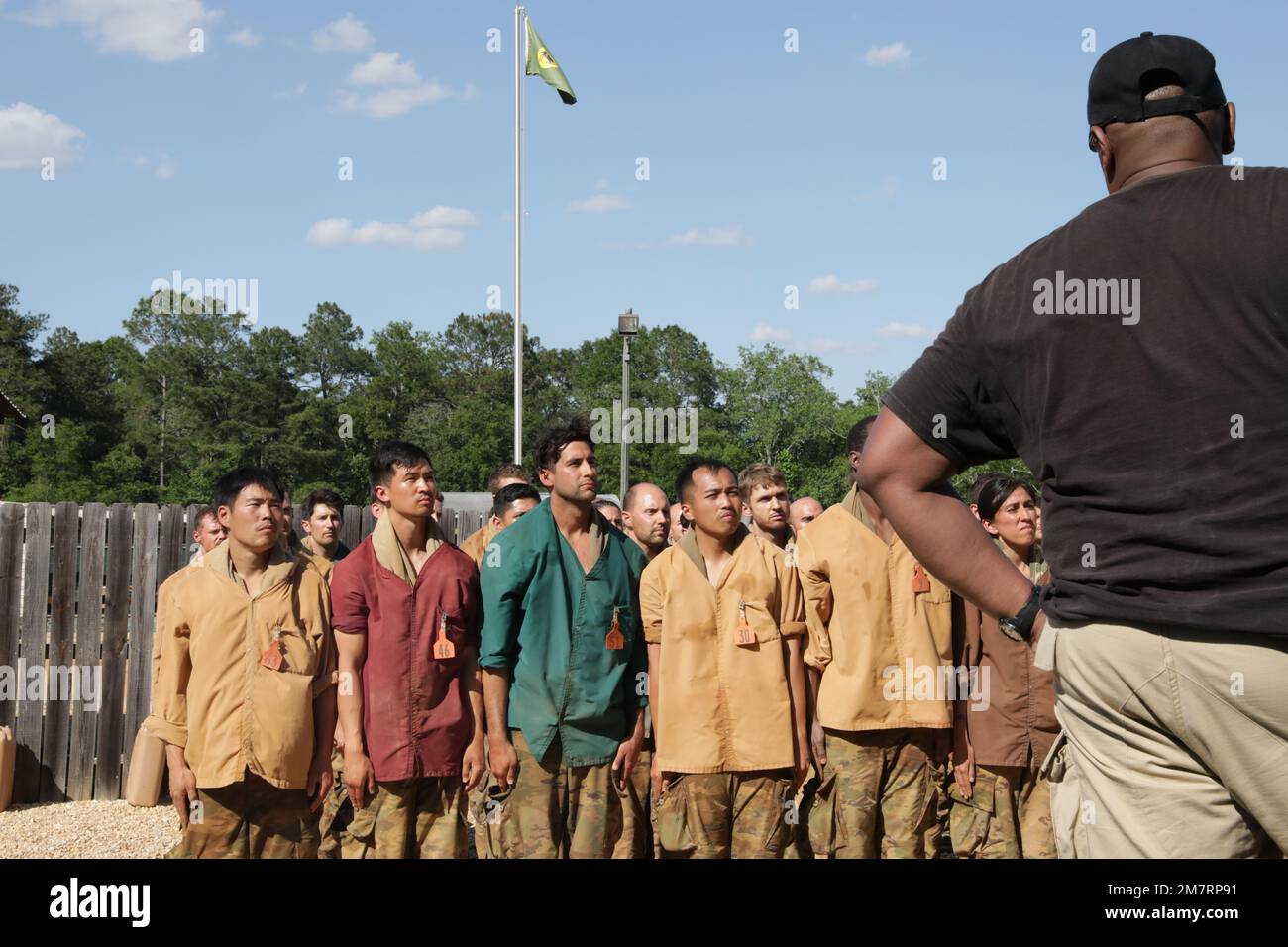 U.S. Army Soldiers attending the Survival, Evasion, Resistance, and Escape (SERE) School stand