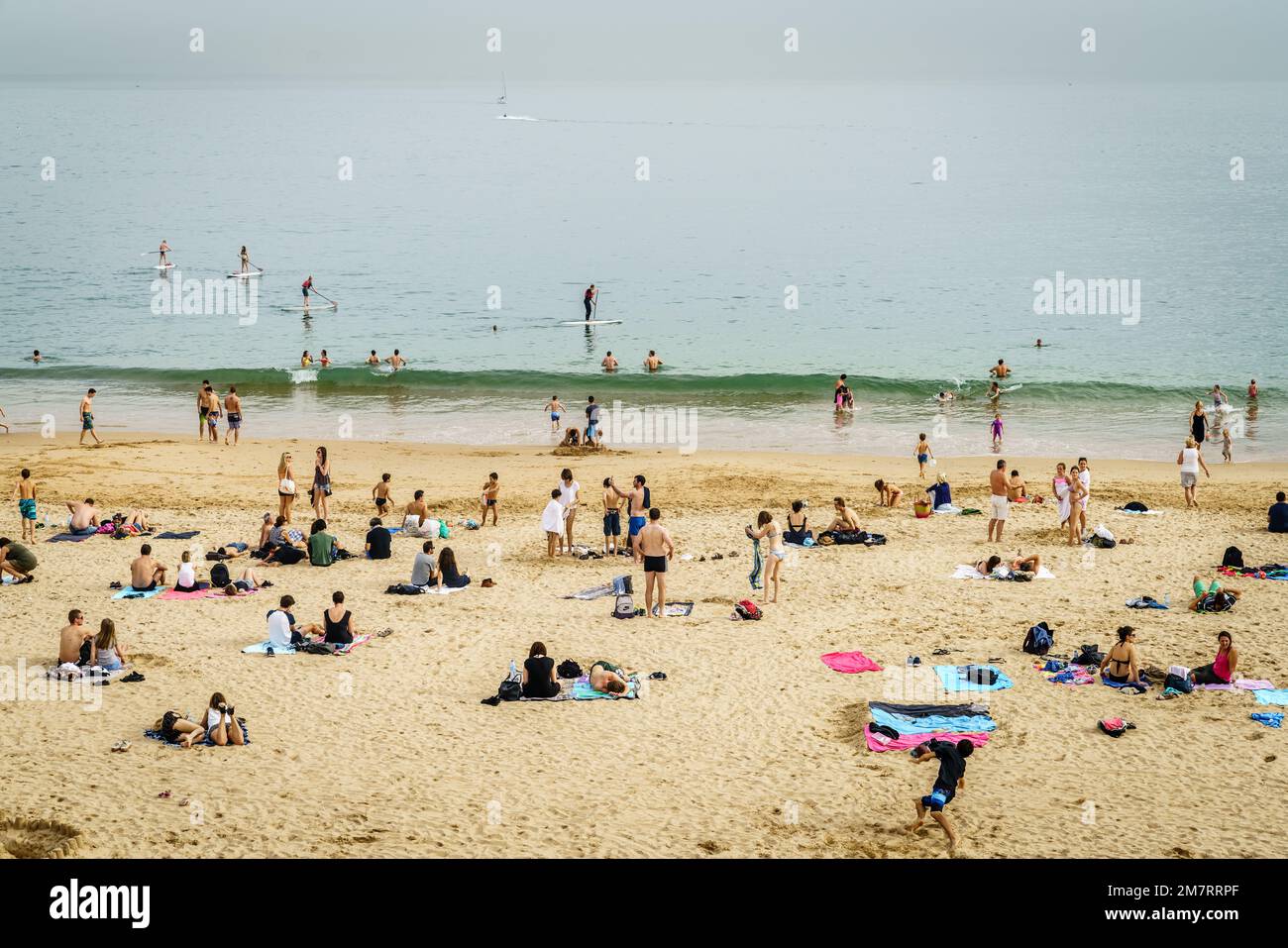 Cascais, Portugal, October 27, 2016: People are enjoying last warm days on a beach in Cascais, Portugal Stock Photo