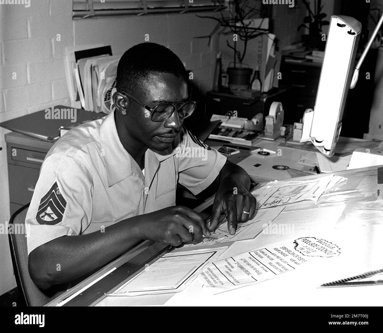 SSGT Moses McNeil is constructing a map of the housing area that is located aboard the Marine Corps Logistics Base. McNeil works for the Graphic Arts Branch of the Facilities and Services Division. Base: Albany State: Georgia (GA) Country: United States Of America (USA) Stock Photo