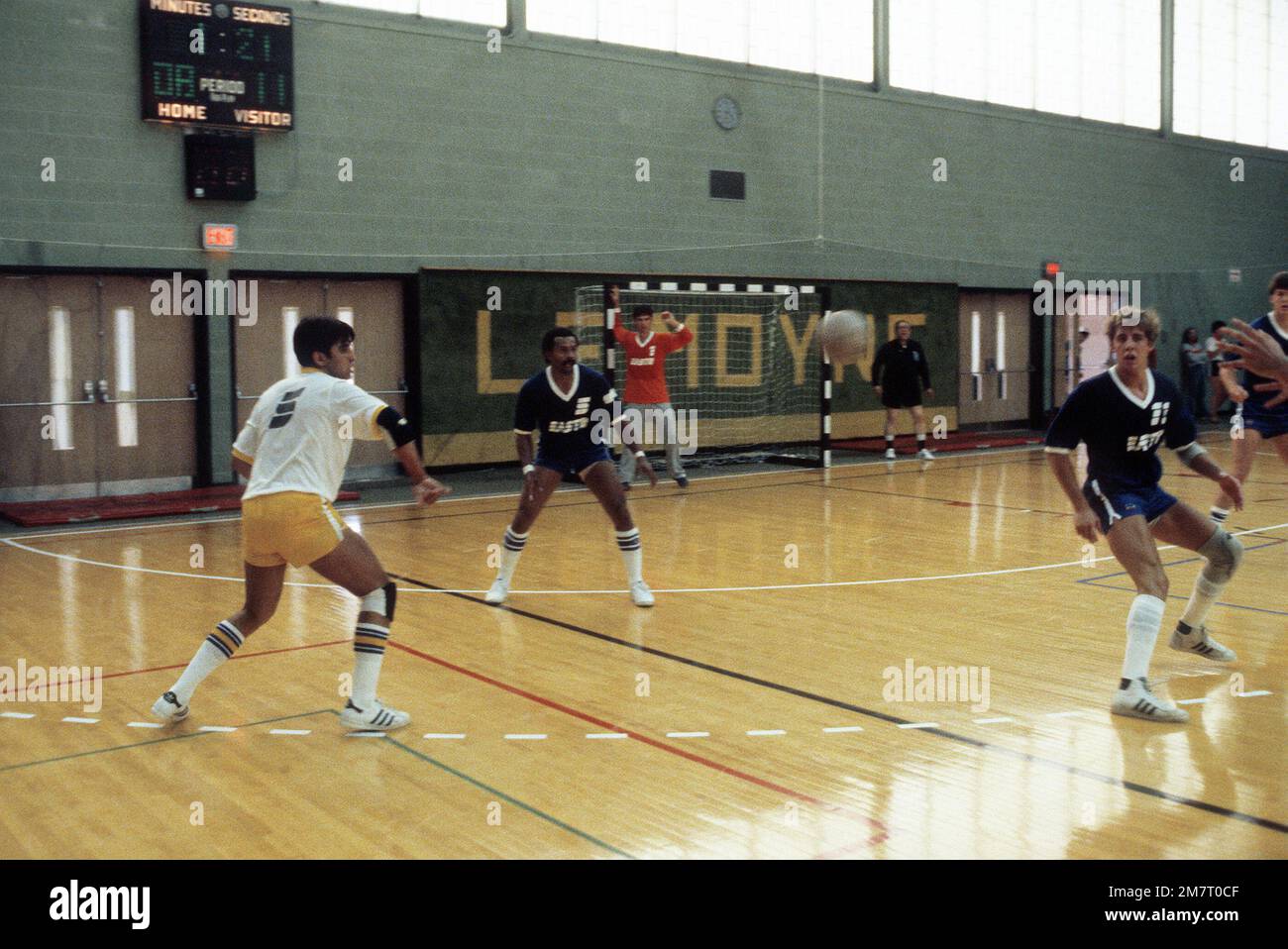 2LT John Del Toro (left) helps his teammates capture the silver medal in team handball, during the 1981 National Sports Festival. Base: Syracuse State: New York (NY) Country: United States Of America (USA) Stock Photo