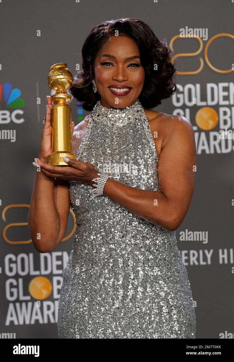 Angela Bassett poses in the press room with the award for best ...