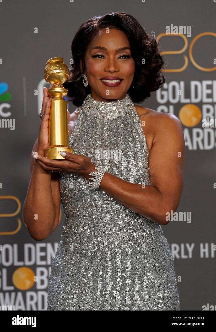 Angela Bassett poses in the press room with the award for best ...